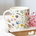 Taza blanca Jardín mágico