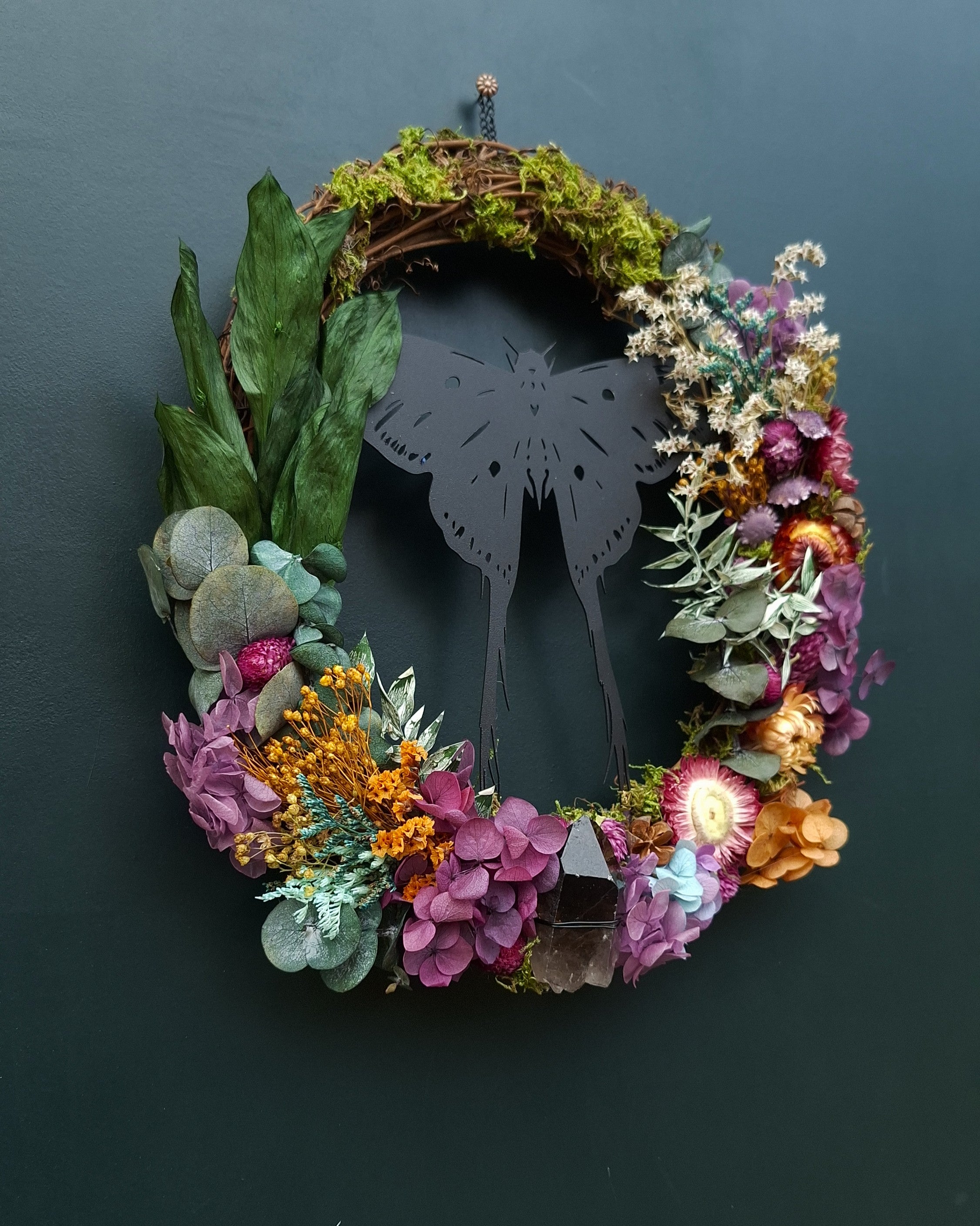 Corona Vuelo entre Flores